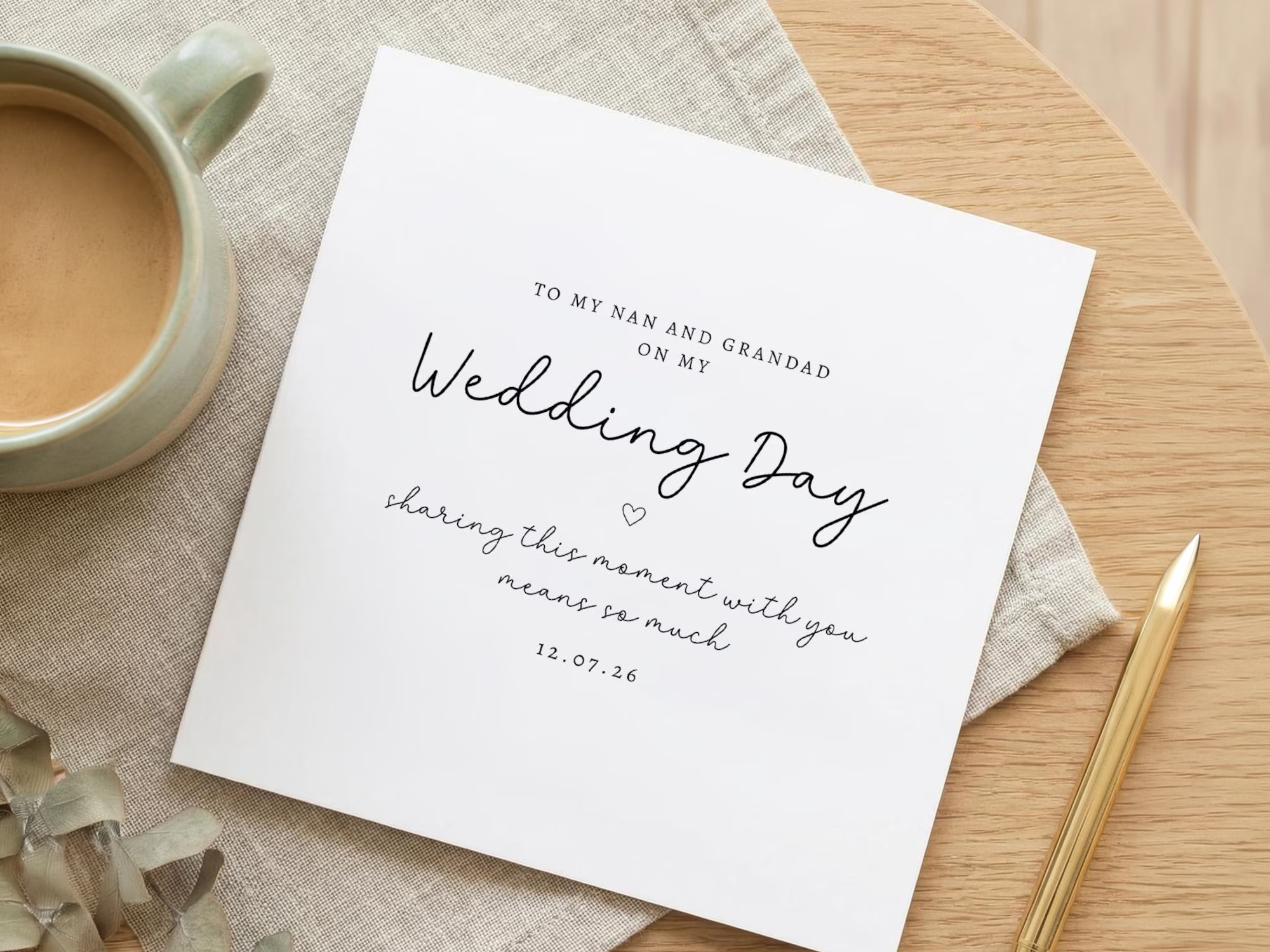 Handmade card with eucalyptus and dried florals on linen